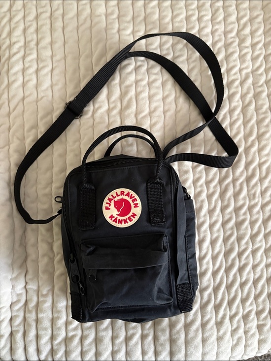 Fjallraven Handbags - Fjallraven Kanken Mini Crossbody in Black with Red Logo